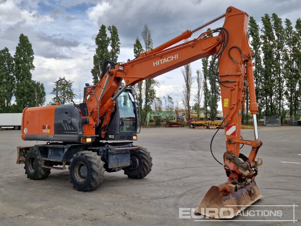 Wheel excavator Hitachi ZX140W-3: picture 7