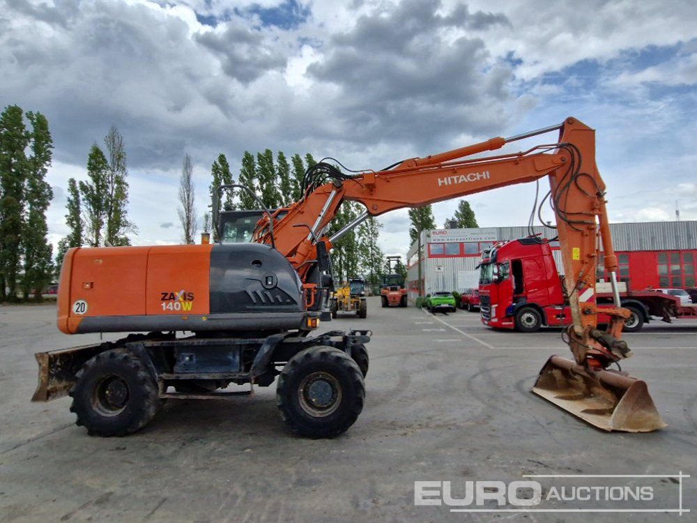 Wheel excavator Hitachi ZX140W-3: picture 6