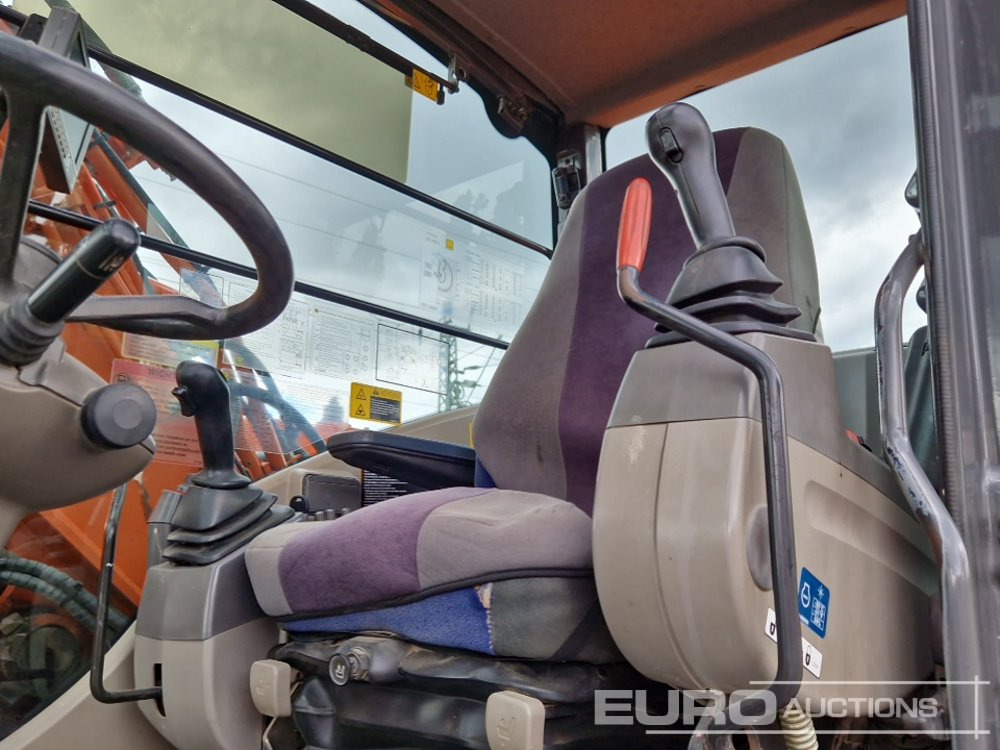 Wheel excavator Hitachi ZX140W-3: picture 36