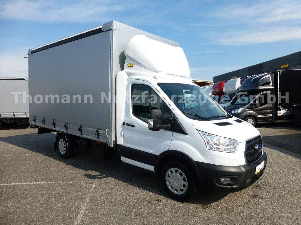 Ford Transit Pritsche Plane 4,25m Klima Temp. DAB - Curtain side van: picture 1 Ford Transit Pritsche Plane 4,25m Klima Temp. DAB - Curtain side van: picture 1