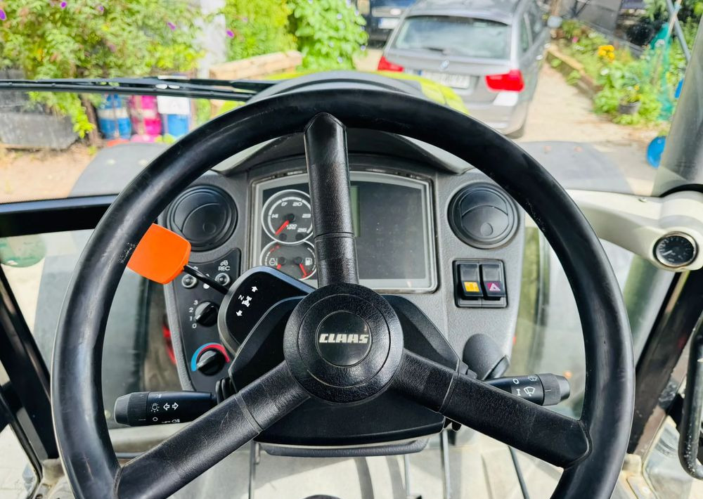 Farm tractor Claas Axos 330: picture 10