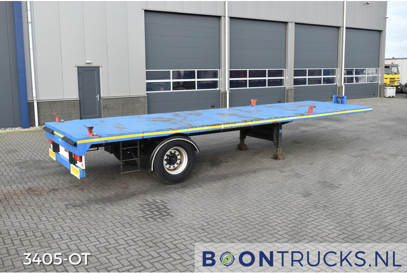Schmitz Cargobull SKO 10 PLATTE BAK | TWISTLOCKS 20ft * L 900 cm * KENTEKEN LANGZAAM VERKEER - Dropside/ Flatbed semi-trailer: picture 1 Schmitz Cargobull SKO 10 PLATTE BAK | TWISTLOCKS 20ft * L 900 cm * KENTEKEN LANGZAAM VERKEER - Dropside/ Flatbed semi-trailer: picture 1